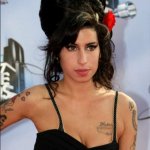 As 12 Tatuagens de Amy Winehouse As 12 Tatuagens de Amy Winehouse